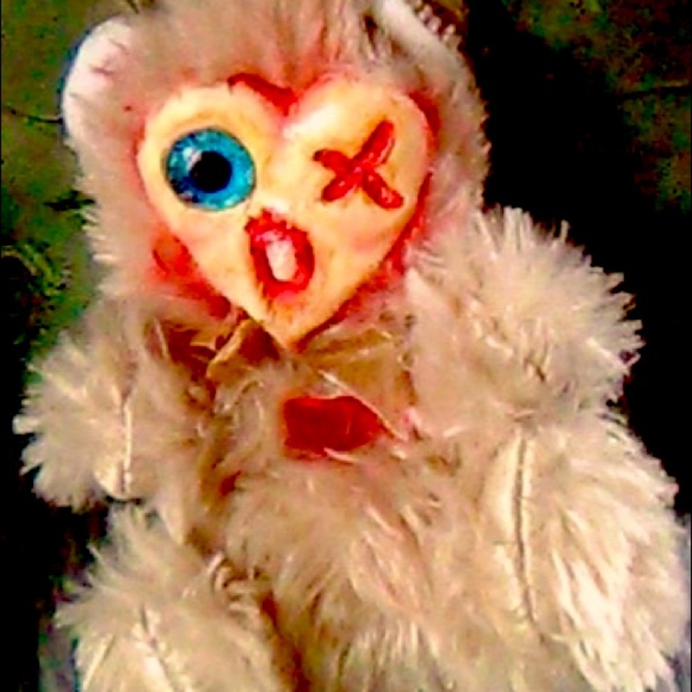 Cute and creepy clay heart shape face completely who made one of a kind